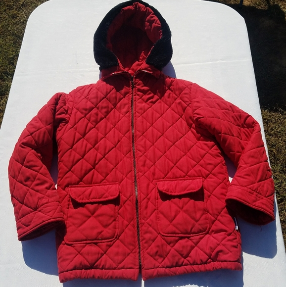 red jacket with black fur hood